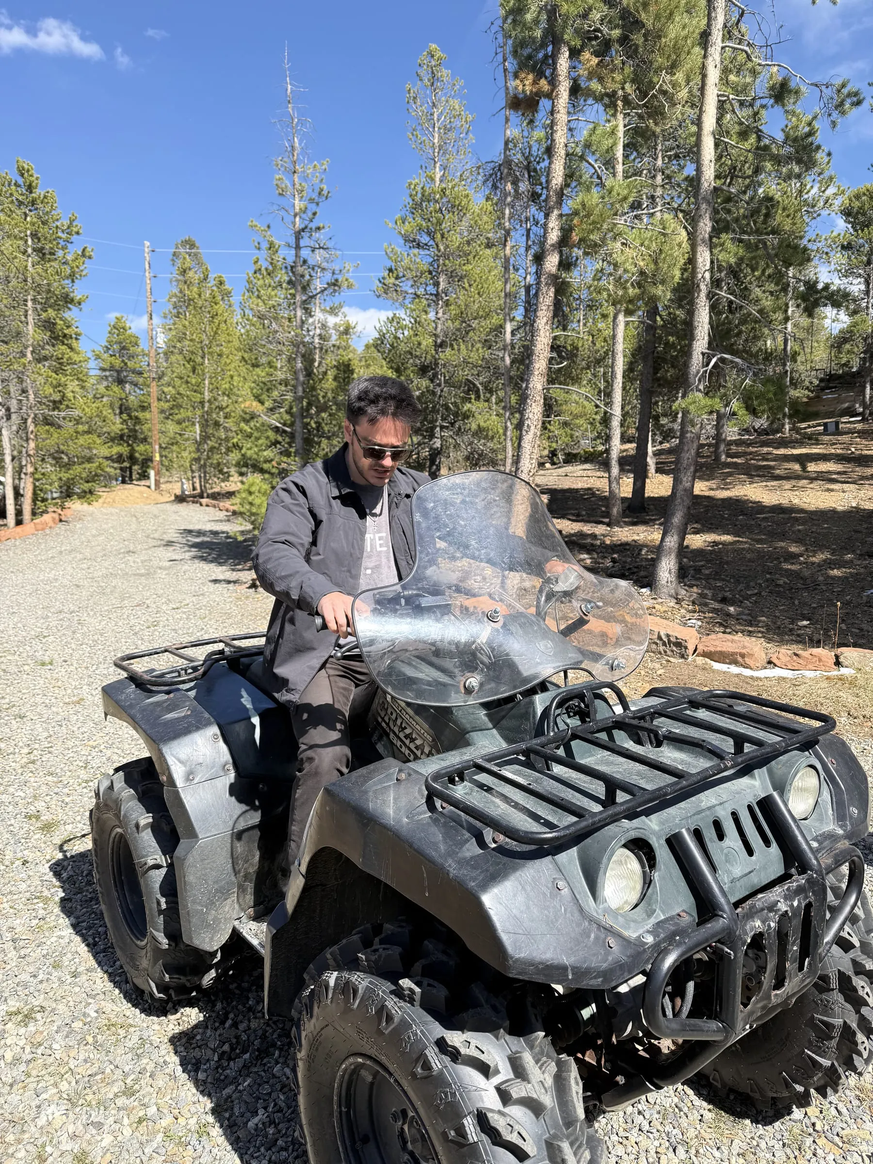 Checking fence line on the ATV